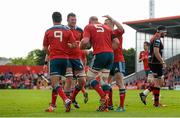 16 May 2015; Paul O'Connell, Munster, is congratulated by team-mates Conor Murray, Donnacha Ryan and Keith Earls after scoring his side's fifth try. Guinness PRO12, Round 22, Munster v Newport Gwent Dragons. Irish Independent Park, Cork. Picture credit: Diarmuid Greene / SPORTSFILE