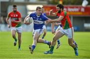16 May 2015; Donal Kingston, Laois, in action against Shane Redmond, Carlow. Leinster GAA Football Senior Championship, Round 1, Carlow v Laois, Netwatch Cullen Park, Carlow. Picture credit: Matt Browne / SPORTSFILE
