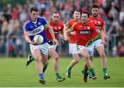 16 May 2015; John O'Loughlin, Laois, in action against David Bambrick and Alan Kelly, Carlow. Leinster GAA Football Senior Championship, Round 1, Carlow v Laois, Netwatch Cullen Park, Carlow. Picture credit: Matt Browne / SPORTSFILE