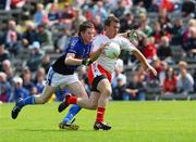 29 June 2008; Conor O'Neill, Tyrone, in action against Mark Leddy, Cavan. ESB Ulster Minor Football Championship semi-final, Cavan v Tyrone, St Tighearnach's Park, Clones, Co. Monaghan. Picture credit: Oliver McVeigh / SPORTSFILE