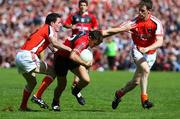 29 June 2008; Daniel Hughes, Down, in action against Andy Mallon and Finnian Moriarty, Armagh. GAA Football Ulster Senior Championship Semi-Final, Down v Armagh, St Tighearnach's Park, Clones, Co. Monaghan. Picture credit: Oliver McVeigh / SPORTSFILE