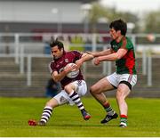 17 May 2015; Peadae Éanna Seoighe, Galway, in action against Peter Collins, Mayo. Connacht Junior Final, Mayo v Galway. Páirc Sean Mac Diarmada, Carrick-on-Shannon, Co. Leitrim. Picture credit: Ray McManus / SPORTSFILE