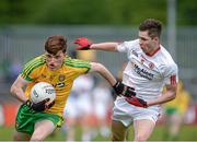 17 May 2015; Naoise O'Baoill, Donegal, in action against Eoighain Murray, Tyrone. Electric Ireland Ulster GAA Football Minor Championship, 1st Round, Donegal v Tyrone. MacCumhaill Park, Ballybofey, Co. Donegal. Picture credit: Oliver McVeigh / SPORTSFILE