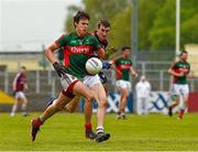 17 May 2015; Cathal Freeman, Mayo, in action against Enda Tierney, Galway. Connacht Junior Final, Mayo v Galway. Páirc Sean Mac Diarmada, Carrick-on-Shannon, Co. Leitrim. Picture credit: Ray McManus / SPORTSFILE