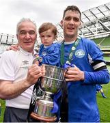 17 May 2015; Crumlin United manager Martin Loughran holds the cup with his grandson, Sonny Robinson, aged 18 months, and captain James Lee. FAI Umbro Intermediate Cup Final, Tolka Rovers v Crumlin United. Aviva Stadium, Lansdowne Road, Dublin. Picture credit: David Maher / SPORTSFILE