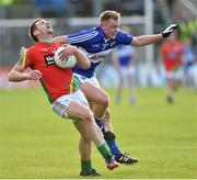 16 May 2015; Ed Finnegan, Carlow, in action against Damien O'Connor, Laois. Leinster GAA Football Senior Championship, Round 1, Carlow v Laois, Netwatch Cullen Park, Carlow. Picture credit: Matt Browne / SPORTSFILE