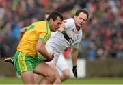 17 May 2015; Frank McGlynn, Donegal, in action against Ronan McNabb, Tyrone. Ulster GAA Football Senior Championship, Preliminary Round, Donegal v Tyrone. MacCumhaill Park, Ballybofey, Co. Donegal. Picture credit: Oliver McVeigh / SPORTSFILE