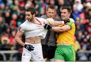 17 May 2015; Patrick McBrearty, Donegal, tussles with Ronan McNamee and Michael O'Neill, Tyrone. Ulster GAA Football Senior Championship, Preliminary Round, Donegal v Tyrone. MacCumhaill Park, Ballybofey, Co. Donegal. Picture credit: Oliver McVeigh / SPORTSFILE