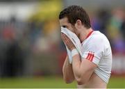 17 May 2015; A dejected Ronan McNamee, Tyone, after the game. Ulster GAA Football Senior Championship, Preliminary Round, Donegal v Tyrone. MacCumhaill Park, Ballybofey, Co. Donegal. Picture credit: Oliver McVeigh / SPORTSFILE