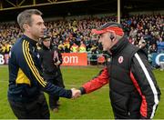 17 May 2015; Rory Gallagher, Donegal manager, and Mickey Harte, Tyrone manager, exchange handshakes at the final whistle. Ulster GAA Football Senior Championship, Preliminary Round, Donegal v Tyrone. MacCumhaill Park, Ballybofey, Co. Donegal. Picture credit: Oliver McVeigh / SPORTSFILE