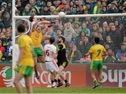 17 May 2015; Colm Cavanagh, Tyrone, hits the crossbar with a punched effort as he is challenged by Michael Murphy, Donegal, deep into added time. Ulster GAA Football Senior Championship, Preliminary Round, Donegal v Tyrone. MacCumhaill Park, Ballybofey, Co. Donegal. Picture credit: Oliver McVeigh / SPORTSFILE