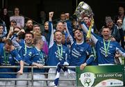 17 May 2015; Liffey Wanderers captain David Andrews, second from right, lifts the trophy in celebration with his teammates. FAI Junior Cup Final, in association with Umbro and Aviva, Liffey Wanderers v Sheriff YC. Aviva Stadium, Lansdowne Road, Dublin.. Picture credit: David Maher / SPORTSFILE