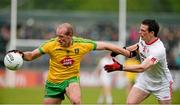 17 May 2015; Neil Gallagher, Donegal, in action against Aidan McCrory, Tyrone. Ulster GAA Football Senior Championship, Preliminary Round, Donegal v Tyrone. MacCumhaill Park, Ballybofey, Co. Donegal. Picture credit: Oliver McVeigh / SPORTSFILE