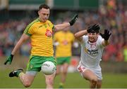 17 May 2015; Martin McElhinney, Donegal, in action against Ronan McNabb, Tyrone. Ulster GAA Football Senior Championship, Preliminary Round, Donegal v Tyrone. MacCumhaill Park, Ballybofey, Co. Donegal. Picture credit: Oliver McVeigh / SPORTSFILE