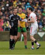 17 May 2015; Michael Murphy, Donegal, centre, complains about Justin McMahon, Tyrone, right, as Referee Joe McQuillan looks on. Ulster GAA Football Senior Championship, Preliminary Round, Donegal v Tyrone. MacCumhaill Park, Ballybofey, Co. Donegal. Picture credit: Oliver McVeigh / SPORTSFILE