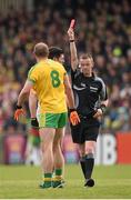 17 May 2015; Neil Gallagher, Donegal, receives a red card from referee Joe McQuillan. Ulster GAA Football Senior Championship, Preliminary Round, Donegal v Tyrone. MacCumhaill Park, Ballybofey, Co. Donegal. Picture credit: Stephen McCarthy / SPORTSFILE