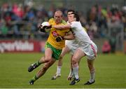 17 May 2015; Neil Gallagher, Donegal, in action against Aidan McCrory, Tyrone. Ulster GAA Football Senior Championship, Preliminary Round, Donegal v Tyrone. MacCumhaill Park, Ballybofey, Co. Donegal. Picture credit: Oliver McVeigh / SPORTSFILE