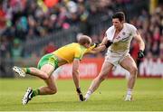 17 May 2015; Neil Gallagher, Donegal, and Sean Cavanagh, Tyrone, tussle off the ball. Ulster GAA Football Senior Championship, Preliminary Round, Donegal v Tyrone. MacCumhaill Park, Ballybofey, Co. Donegal. Picture credit: Stephen McCarthy / SPORTSFILE