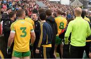 17 May 2015; Players and officals of Donegal and Tyrone leave the pitch at halftime. Ulster GAA Football Senior Championship, Preliminary Round, Donegal v Tyrone. MacCumhaill Park, Ballybofey, Co. Donegal. Picture credit: Stephen McCarthy / SPORTSFILE