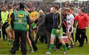 17 May 2015; Players and officals of Donegal and Tyrone leave the pitch at halftime. Ulster GAA Football Senior Championship, Preliminary Round, Donegal v Tyrone. MacCumhaill Park, Ballybofey, Co. Donegal. Picture credit: Stephen McCarthy / SPORTSFILE