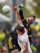17 May 2015; Paul Durcan, Donegal, in action against Conor McAliskey, Tyrone. Ulster GAA Football Senior Championship, Preliminary Round, Donegal v Tyrone. MacCumhaill Park, Ballybofey, Co. Donegal. Picture credit: Stephen McCarthy / SPORTSFILE