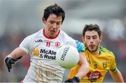 17 May 2015; Mattie Donnelly, Tyrone, in action against Ryan McHugh, Donegal. Ulster GAA Football Senior Championship, Preliminary Round, Donegal v Tyrone. MacCumhaill Park, Ballybofey, Co. Donegal. Picture credit: Stephen McCarthy / SPORTSFILE