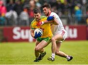 17 May 2015; Paddy McGrath, Donegal, in action against Darren McCurry, Tyrone. Ulster GAA Football Senior Championship, Preliminary Round, Donegal v Tyrone. MacCumhaill Park, Ballybofey, Co. Donegal. Picture credit: Stephen McCarthy / SPORTSFILE