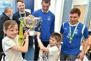 18 May 2015; Liffey Wanderers players, fromO'Connor with Robin Fitzpatrick, age 10, and Christopher Stokes, age 7, and the FAI Junior Cup trophy during a visit to Temple Street Hospital, Temple Street Hospital, Dublin. Picture credit: Cody Glenn / SPORTSFILE