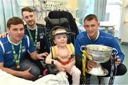 18 May 2015; Liffey Wanderers players, from left to right, Anthony O'Connor, Paul Gannon and Gary Young with Grace Cogan, age 7, of Monaghan, and the FAI Junior Cup trophy during a visit to Temple Street Hospital, Temple Street Hospital, Dublin. Picture credit: Cody Glenn / SPORTSFILE