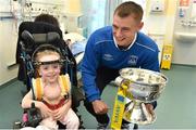 18 May 2015; Liffey Wanderers player Gary Young with Grace Cogan, age 7, from Monaghan, and the FAI Junior Cup trophy during a visit to Temple Street Hospital, Temple Street Hospital, Dublin. Picture credit: Cody Glenn / SPORTSFILE