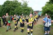 26 June 2008; The Scottish select team leads the Belfast Cuchulainns team onto the field as Ulster GAA host The Belfast Cuchulainns against a Scottish Shinty select. Stormont, Belfast, Co. Antrim. Picture credit: Oliver McVeigh / SPORTSFILE