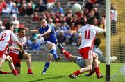 29 June 2008; Mark Kelly, Cavan, goes close with a goal chance against Tyrone players Tim Harney and Matthew Donnelly. ESB Ulster Minor Football Championship semi-final, Cavan v Tyrone, St Tighearnach's Park, Clones, Co. Monaghan. Picture credit: Oliver McVeigh / SPORTSFILE