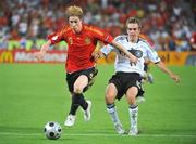 29 June 2008; Fernando Torres, Spain, in action against Philipp Lahm, Germany. UEFA EURO 2008TM, Final, Germany v Spain, Ernst Happel Stadion, Vienna, Austria. Picture credit; Pat Murphy / SPORTSFILE