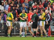 6 July 2008; Marc O Se, second from left, Kerry, attempts to explain himself referee Derek Fahy before being shown a red card. GAA Football Munster Senior Championship Final, Kerry v Cork, Pairc Ui Chaoimh, Cork. Picture credit: Brendan Moran / SPORTSFILE