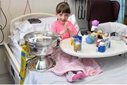 18 May 2015; Danika Melia, 8, of Santry Co. Dublin, with the FAI Junior Cup during a visit by Liffey Wanderers to Temple Street Hospital, Temple Street, Dublin. Picture credit: Cody Glenn / SPORTSFILE
