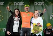 18 May 2015;  Alex Frame, New Zealand National Team, after receiving the LeasePlan Stage Jersey from Martina O'Donoghue, left, Account Manager LeasePlan, and Miss An Post Rás Tracy Byrne, following Stage 2 of the 2015 An Post Rás. Carlow - Tipperary. Photo by Sportsfile