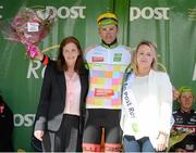 18 May 2015; Robert Patrick, NFTO NPC, after receiving the One4All Bikes4Work King of the Mountains Jersey Classification from Margaret McCoy, Tipperary branch manager, and Miss An Post Rás Tracy Byrne, following Stage 2 of the 2015 An Post Rás. Carlow - Tipperary. Photo by Sportsfile