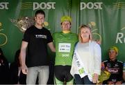 18 May 2015;  Aaron Gate, An Post Chain Reaction, after receiving The Post Office Sprint Jersey Classification from John Davies, bikeshop manager Abbey Service, and Miss An Post Rás Tracy Byrne, following Stage 2 of the 2015 An Post Rás. Carlow - Tipperary. Photo by Sportsfile