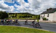 19 May 2015; A view of the peloton as it makes its way through Broadford, Co. Limerick, during Stage 3 of the 2015 An Post Rás. Tipperary - Bearna. Photo by Sportsfile