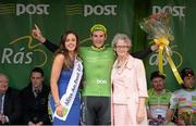 19 May 2015; Alex Frame, New Zealand National Team, after receiving the Post Office Sprint Jersey Classification from Shauna Fagan, Postmistress Bearna Post Office, and Miss An Post Rás Aisling Feeney following Stage 3 of the 2015 An Post Rás. Tipperary - Bearna. Photo by Sportsfile