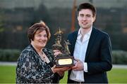 19 May 2015; 800m runner Mark English, is presented with the Dr. Tony O’Neill Sports Person of the Year Award by Mrs. Marjorie Fitzpatrick, sister of Dr. O'Neill, at the Bank of Ireland UCD Athletic Union Council Sports Awards 2014/15. UCD, Belfield, Dublin. Picture credit: Brendan Moran / SPORTSFILE