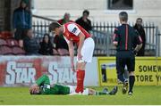 19 May 2015; Danny Morrissey, Cork City, lies injured after a challange with Jason McGuinness, St. Patrick's Athletic. EA Sports Cup Quarter-Final, Cork City v St. Patrick's Athletic, Turners Cross, Cork. Picture credit: David Maher / SPORTSFILE