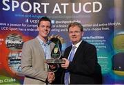 19 May 2015; Stephen Coen, left, captain of the UCD Freshers Gaelic Football team, receives the Varsity Team of the Year award on behalf of his team, from Liam McLoughlin, Chief Executive, Retail Ireland, Bank of Ireland, from at the Bank of Ireland UCD Athletic Union Council Sports Awards 2014/15. UCD, Belfield, Dublin. Picture credit: Brendan Moran / SPORTSFILE