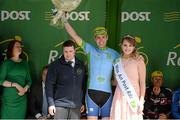 20 May 2015; Ian Richardson, UCD, after receiving the One Direct County Jersey from Miss An Post Rás Siofra Loftus and David Leydon, Sales Advisor, One Direct, following Stage 4 of the 2015 An Post Rás. Bearna - Newport. Photo by Sportsfile