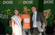 20 May 2015; Aidis Kruopis, An Post Chain Reaction, after receiving the LeasePlan Stage Jersey from An Post Rás Siofra Loftus and Kevin Feeney, Corporate Sales Manager LeasePlan, following Stage 4 of the 2015 An Post Rás. Bearna - Newport. Photo by Sportsfile