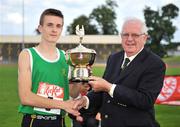 28 June 2008; President of the Irish Schools Athletics Association Michael Hunt presents Paul Whelan, Templeogue College, Dublin, with the award for Best Boy athlete at the KitKat Tailteann inter provincial track & field final. Morton Stadium, Santry, Dublin. Picture credit: Stephen McCarthy / SPORTSFILE
