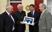 30 June 2008; Cardinal Sean Brady receives a momento from Tom Daly, President of the Ulster Council, Danny Murphy, left, and Michael Hasson. Ulster Council Offices, Armagh. Picture credit: Mickey Cullen / SPORTSFILE