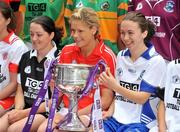 30 June 2008; Cork captain Angela Walsh holds the Brendan Martin cup with Rebecca Hallahan, Waterford, right, alongside Martina Keane, Sligo, at the TG4 All-Ireland Ladies Football Championship Launch. Croke Park, Dublin. Picture credit: Stephen McCarthy / SPORTSFILE