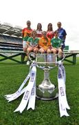 30 June 2008; Players representing counties involved in the TG4 All-Ireland Ladies Junior Championship with the West County Hotel cup, back row, from left, Aine Kinsella, Carlow, Louise Glass, Derry, Grace Lynch, Louth, and Emer Miley, Wicklow. Front row, from left, Patricia Stapleton, Offaly, Eimear Roantree, representing Antrim, and Niamh McMullen, representing London, at the TG4 All-Ireland Ladies Football Championship Launch, Croke Park, Dublin. Picture credit: Stephen McCarthy / SPORTSFILE
