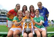 30 June 2008; Players representing counties involved in the TG4 All-Ireland Ladies Junior Championship with the West County Hotel cup, back row, from left, Aine Kinsella, Carlow, Louise Glass, Derry, Grace Lynch, Louth, and Emer Miley, Wicklow. Front row, from left, Patricia Stapleton, Offaly, Eimear Roantree, representing Antrim, and Niamh McMullen, representing London, at the TG4 All-Ireland Ladies Football Championship Launch. Croke Park, Dublin. Picture credit: Stephen McCarthy / SPORTSFILE